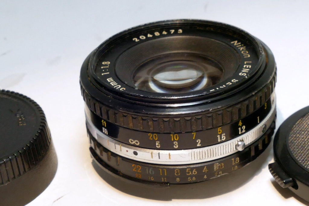 Nikon E series 50mm f1.8 Ai-s Lens prime pancake with little bit of fungus