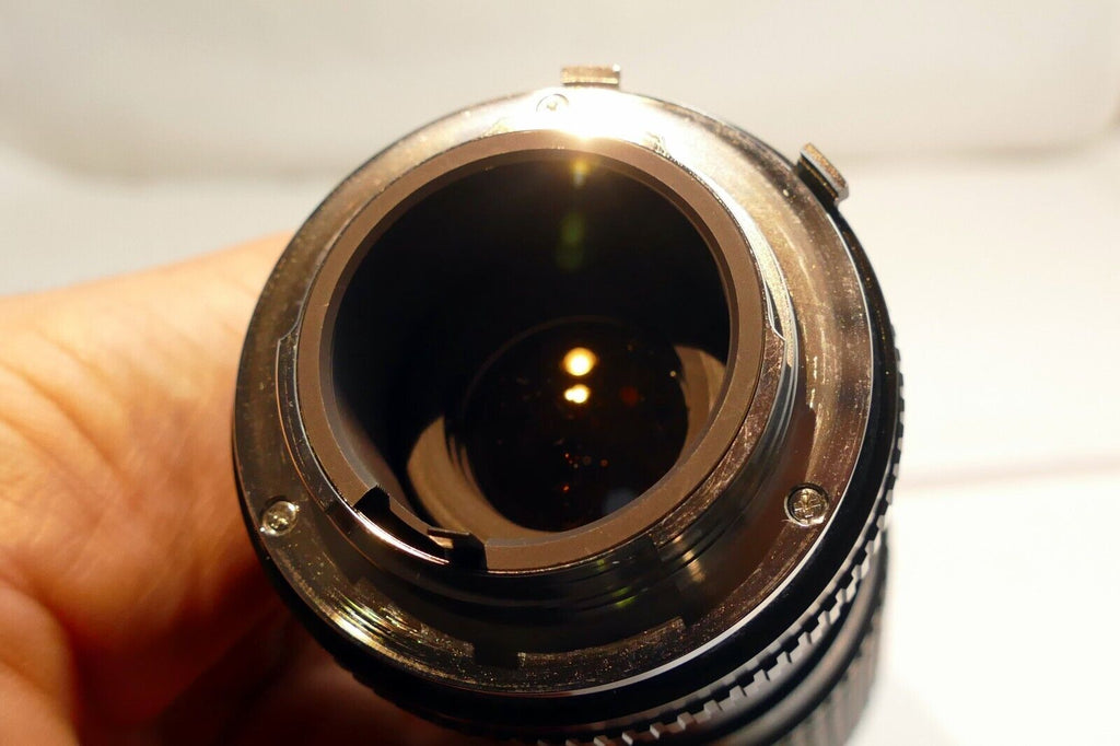 RMC Tokina 80-200mm f4.5 manual focus Lens for Minolta MD mount (w/ light haze)