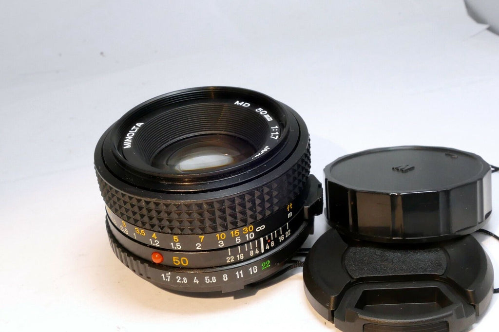 Minolta 50mm f1.7 MD manual focus with couple spots of fungus webbing works good