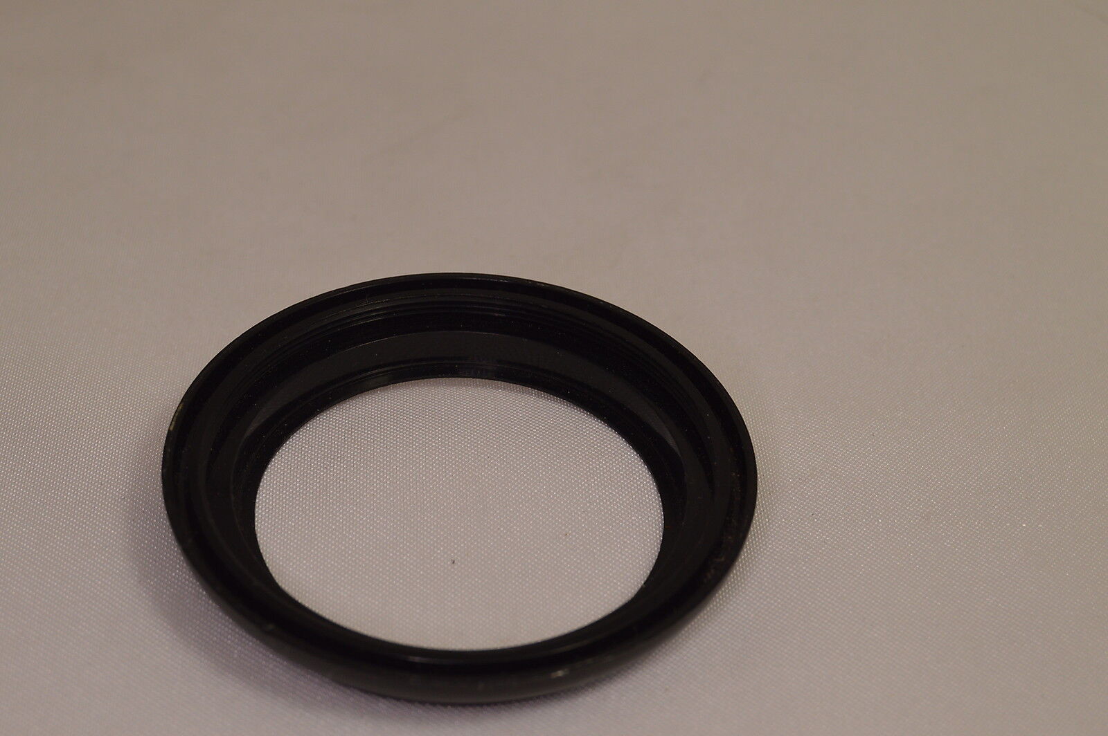 Plastic lens ring 49-49mm not sure for what lens 9216034