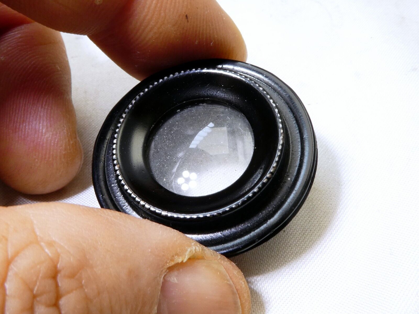Rear lens filter with metal ring