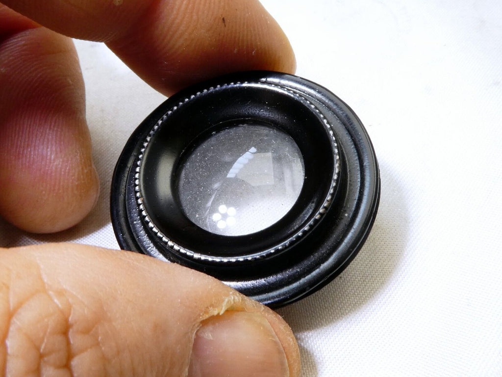 Rear lens filter with metal ring