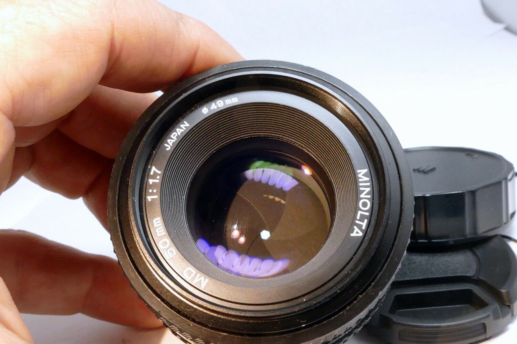 Minolta 50mm f1.7 MD manual focus with couple spots of fungus webbing works good