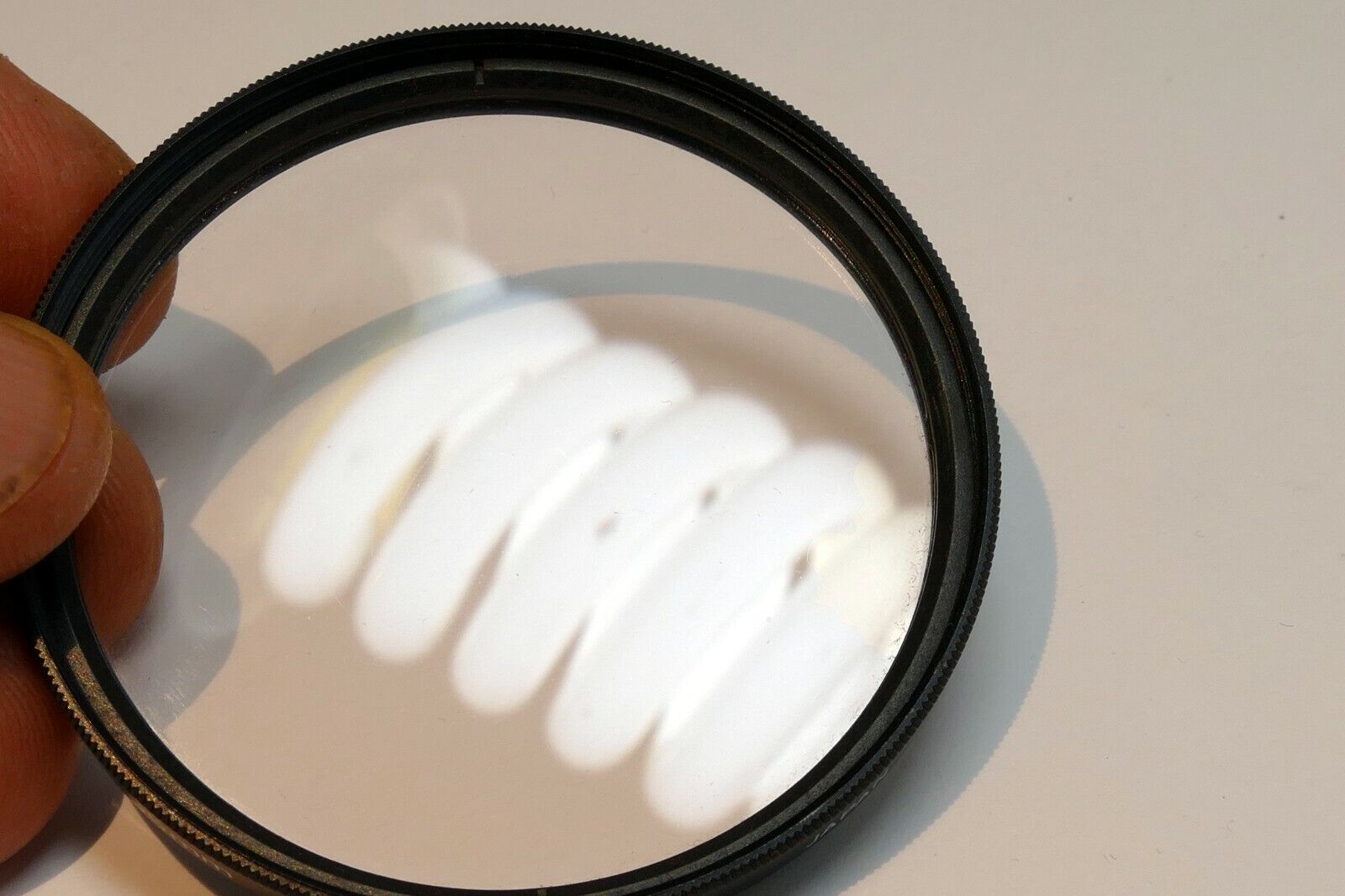 Vivitar  55mm Filter Skylight 1A sky  ( with coating scratched )