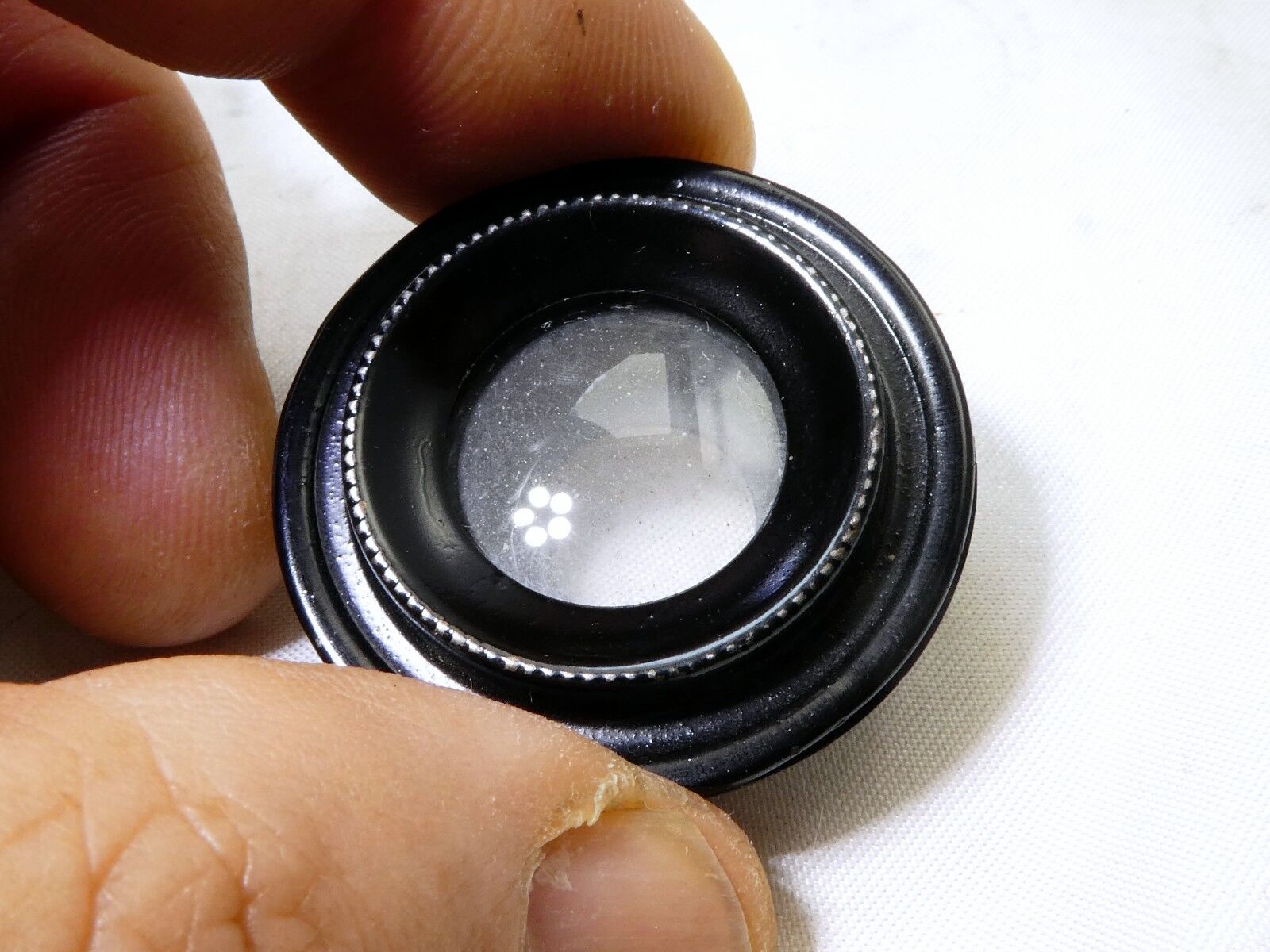 Rear lens filter with metal ring
