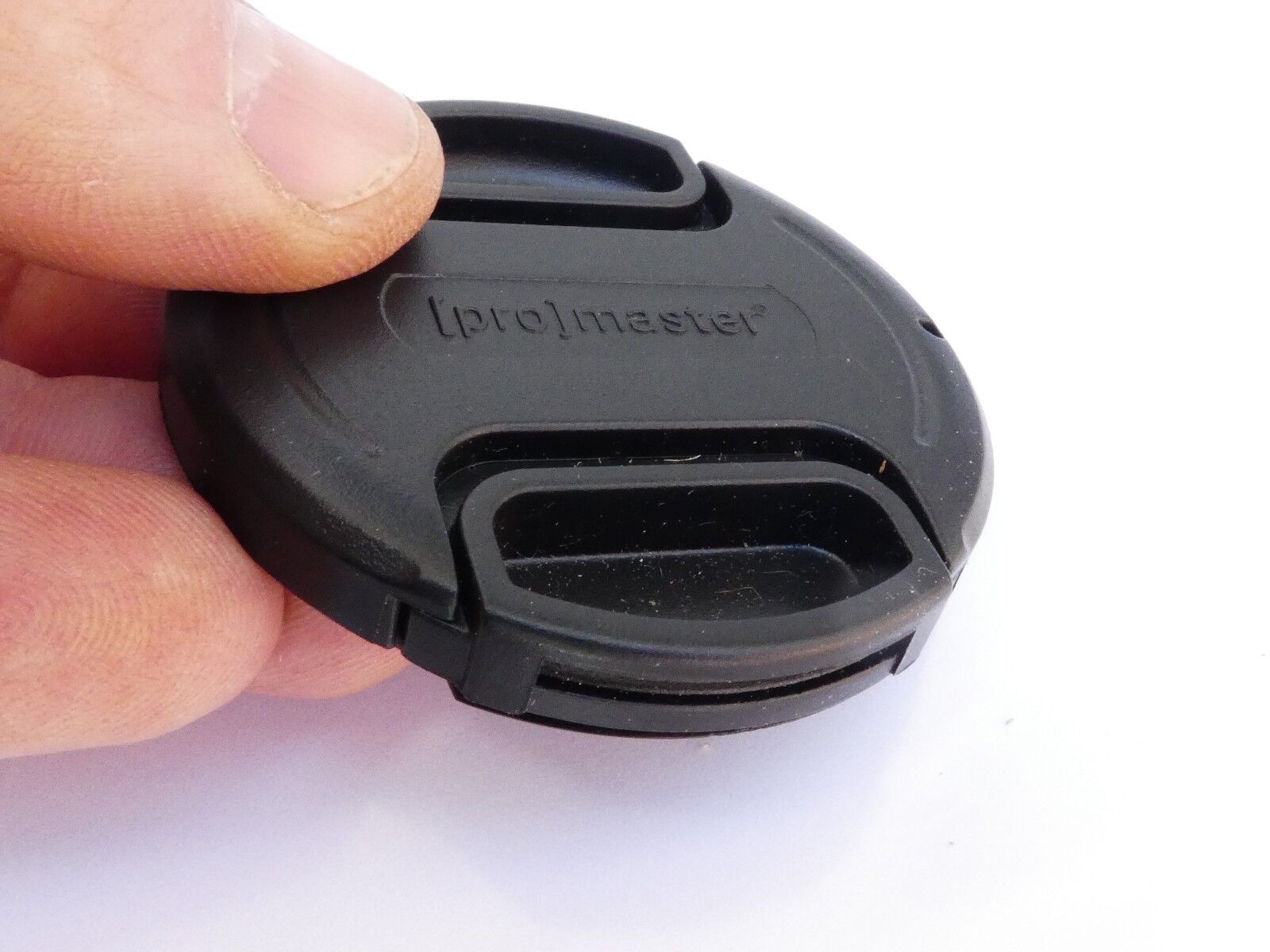 Promaster 52mm Front  Lens cap plastic snap on type