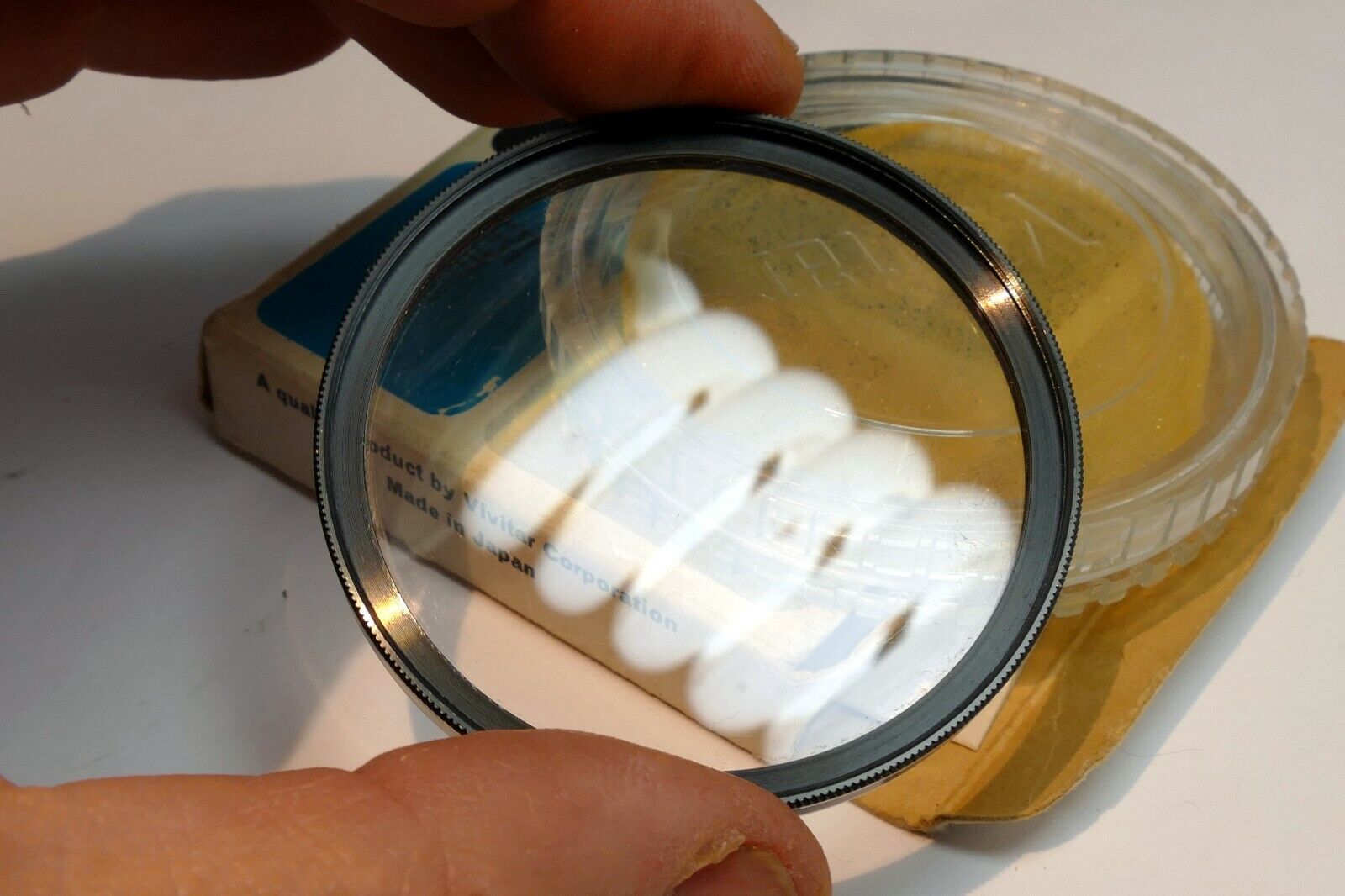 Vivitar 55mm Filter Skylight 1A  with plastic case (with some scratches)