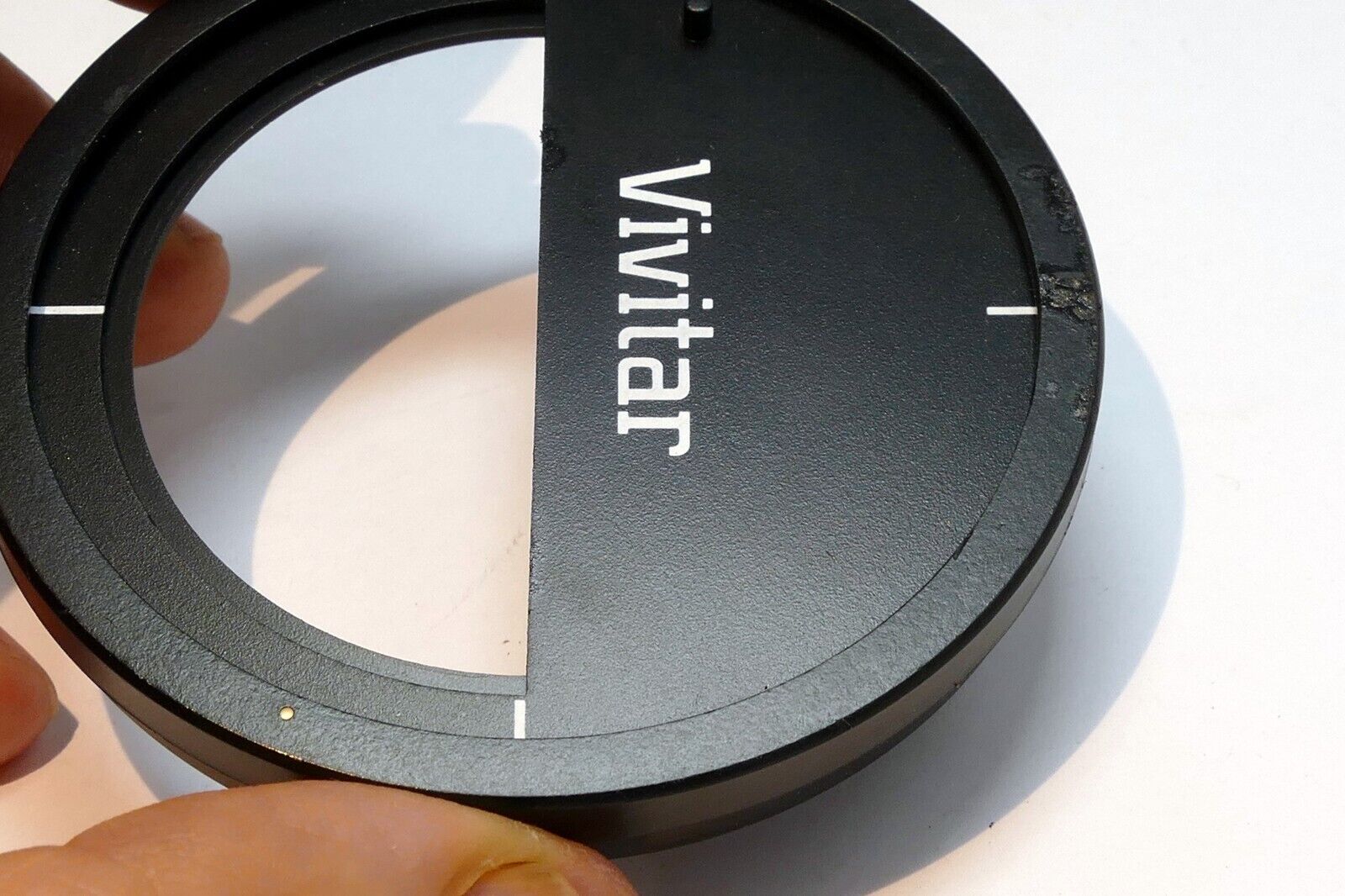 Vivitar half fame field rotating adapter for the lens