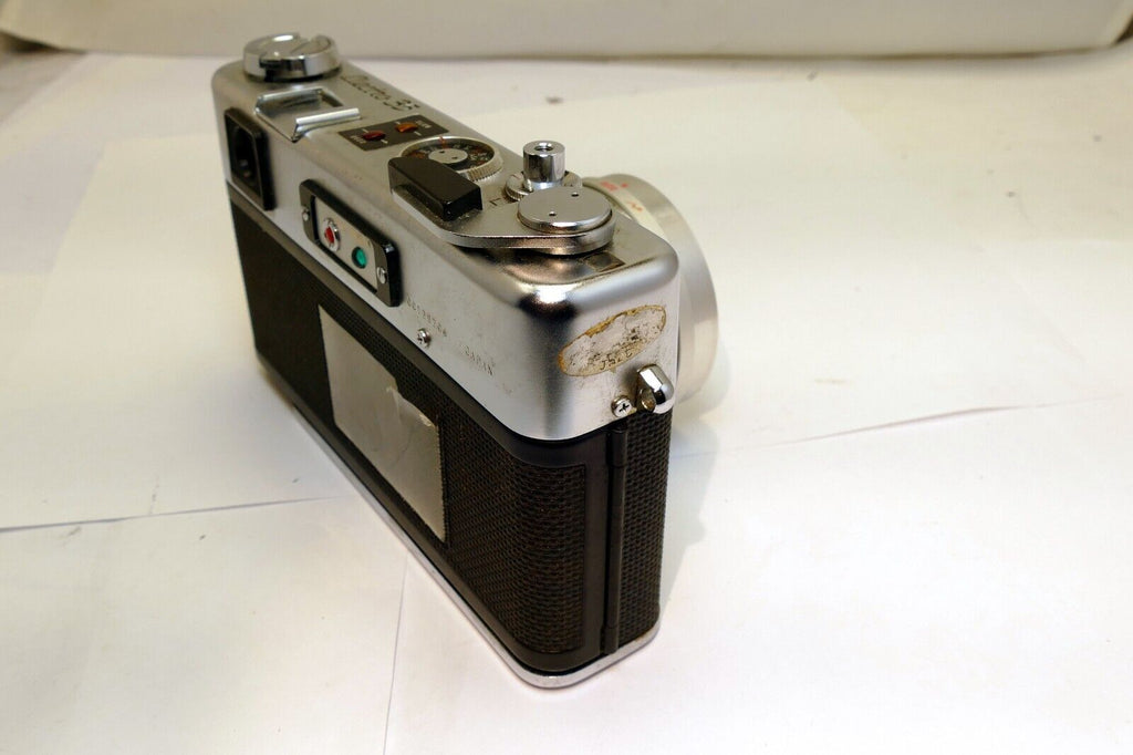Yashica Electro 35 camera with 45mm f1.7 lens AS IS missing battery cover parts