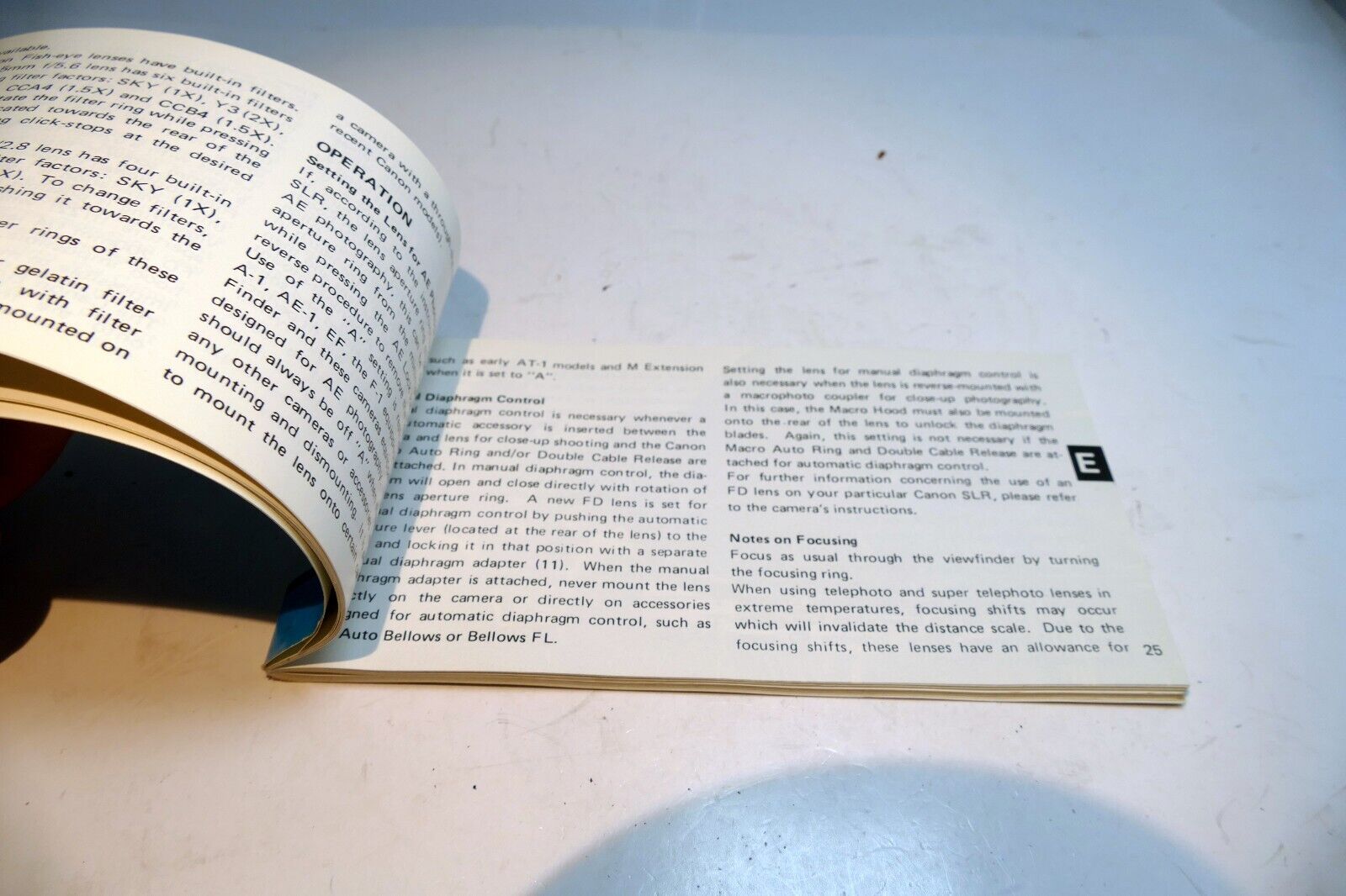 Canon FD lens table guide brochure (manual focus ) J E F G S