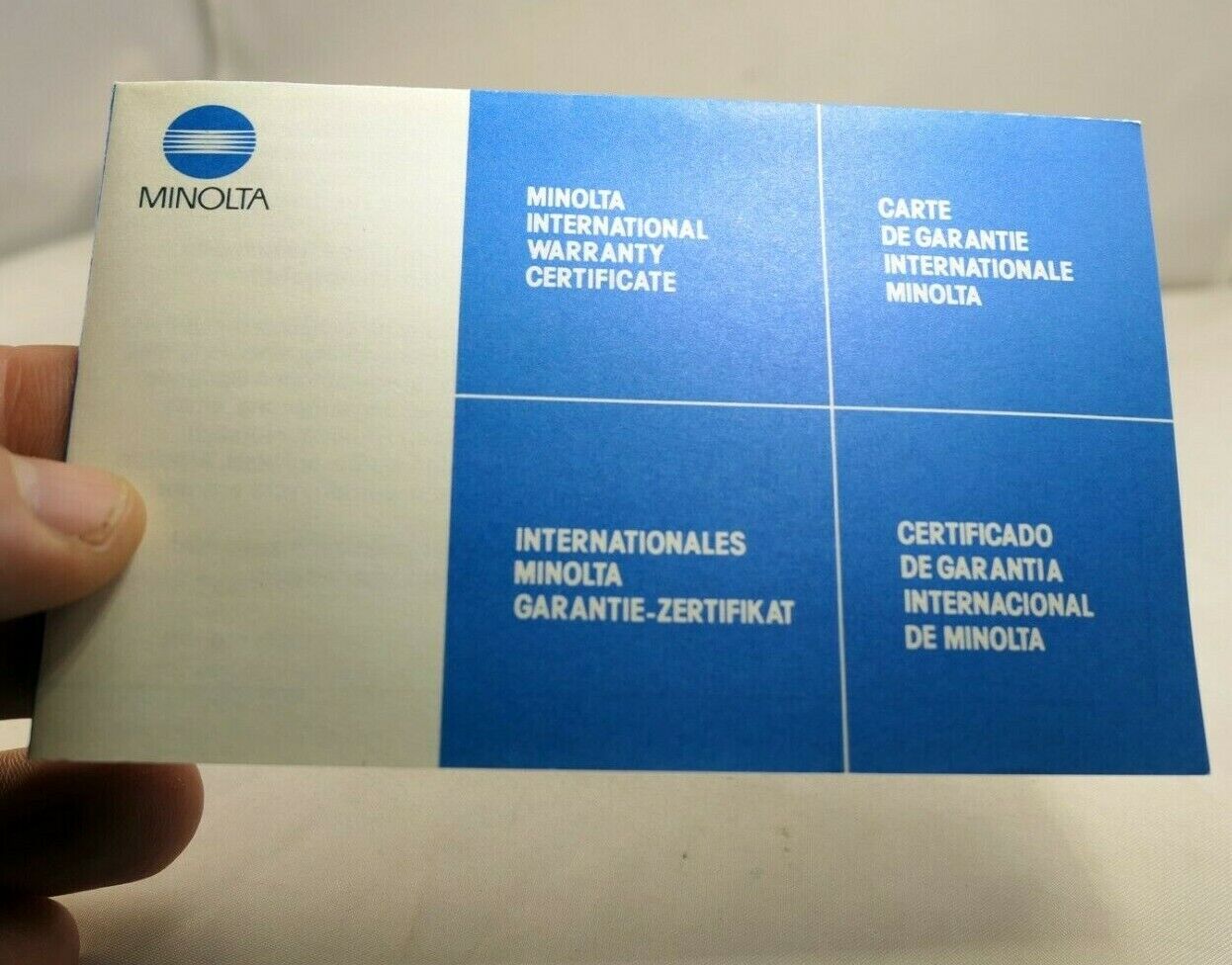 MINOLTA  warranty information  for Maxxum 70-210mm f4 AF  lens
