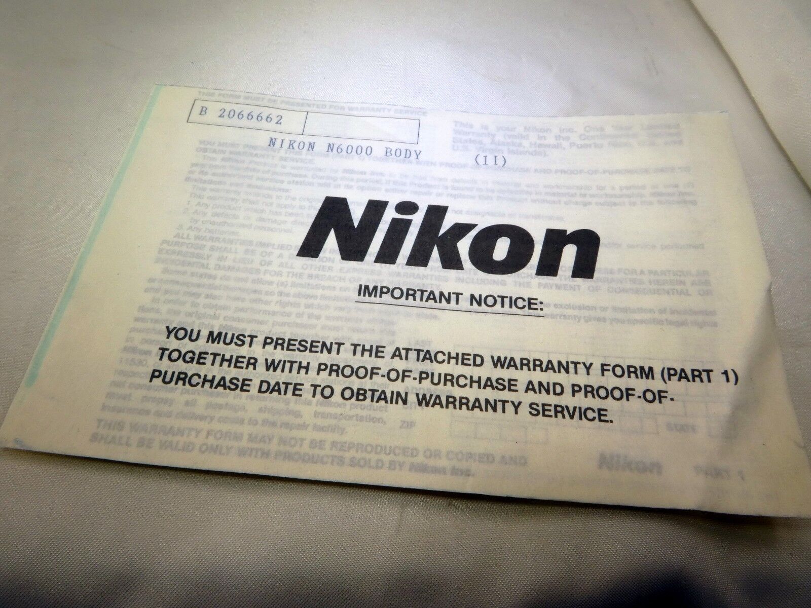 Nikon vintage warranty card (expired) for N6000  camera  EN