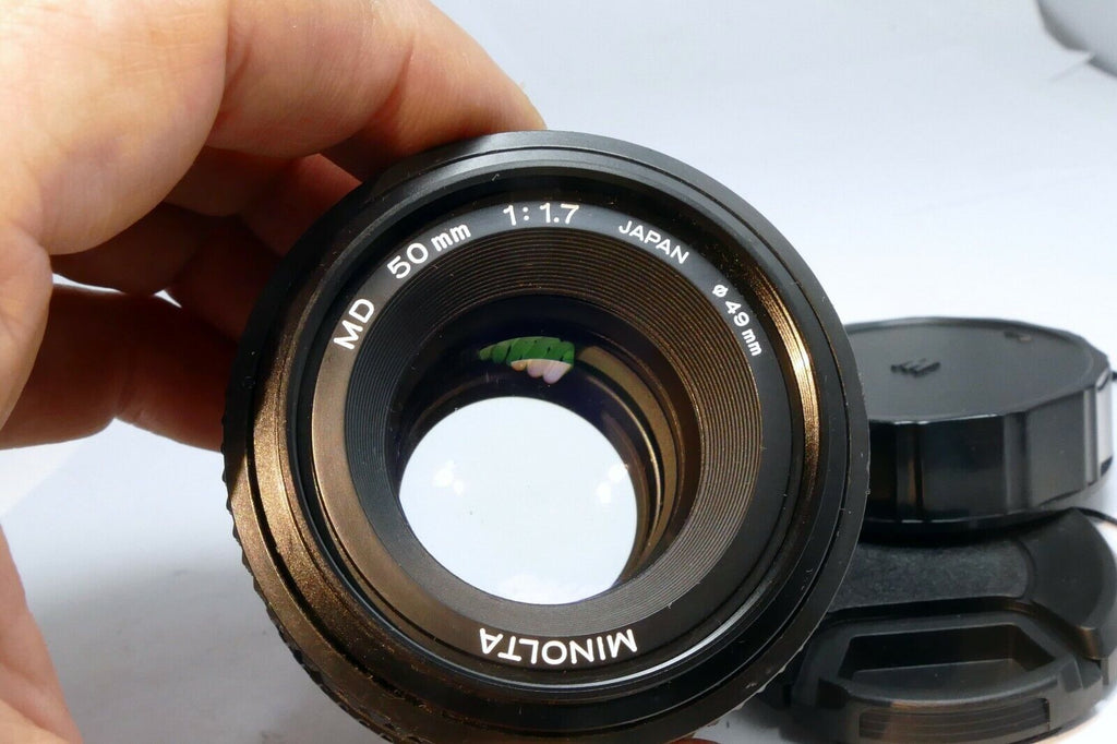 Minolta 50mm f1.7 MD manual focus with couple spots of fungus webbing works good