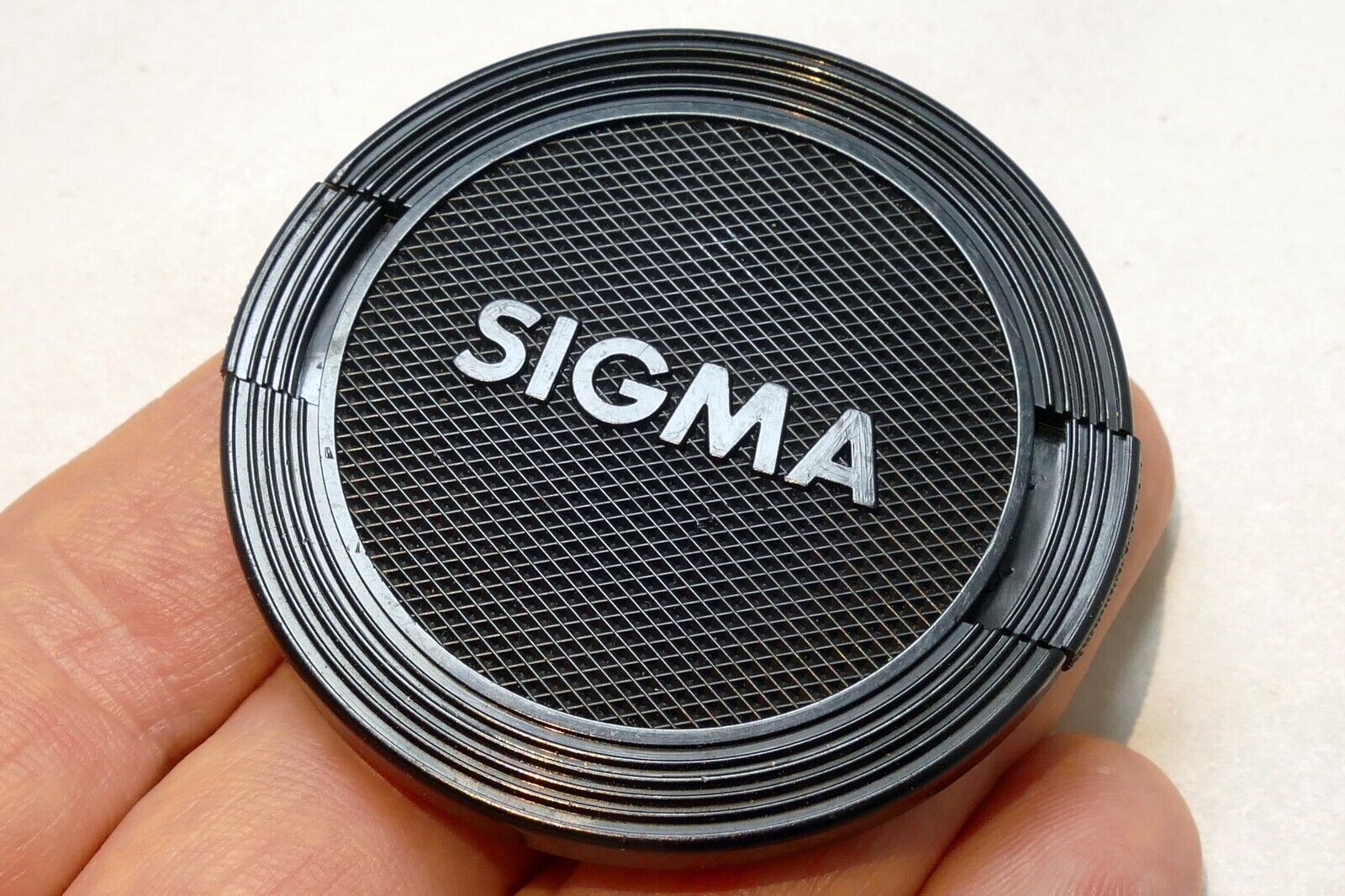 Sigma 52mm lens front cap (snap on type) for 28mm mini-wide