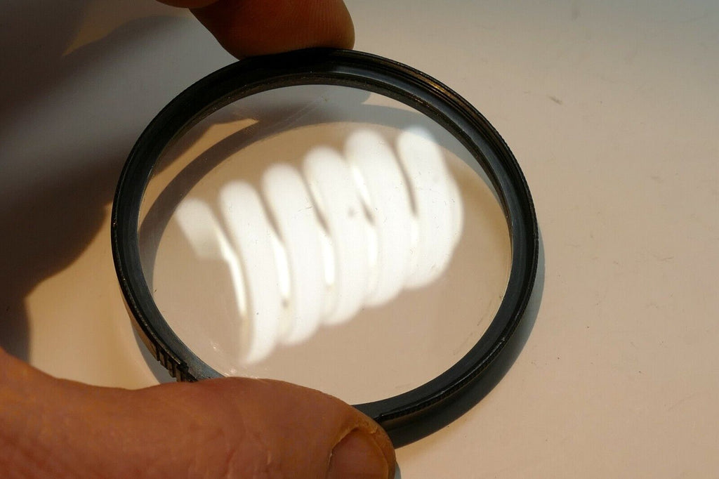 Rolev M.G. 55mm Filter UV ( with damaged rim)