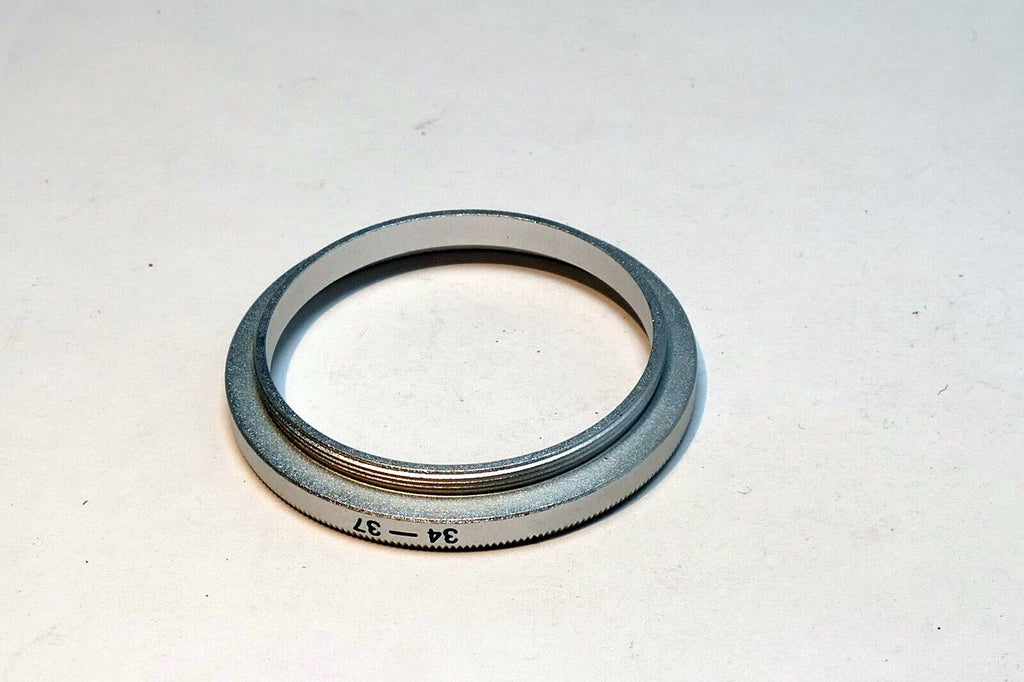 34mm to 37mm Step Up lens ring adapter  screw in threaded (chrome)