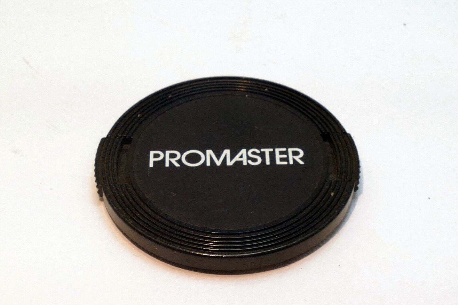 Promaster  52mm front lens cap for 28mm f2.8 50mm macro