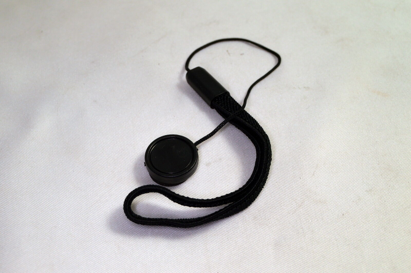 Lens Cap Keeper/ holder stick on type with string