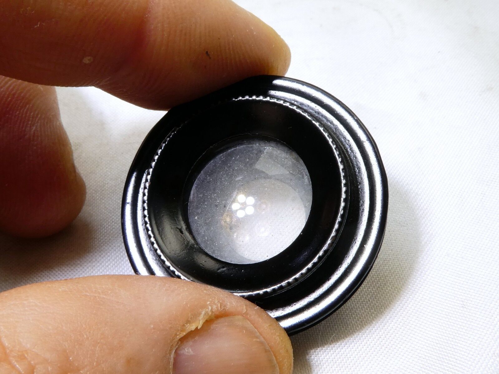 Rear lens filter with metal ring