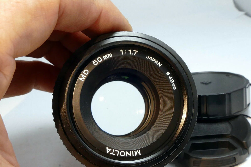 Minolta 50mm f1.7 MD manual focus with couple spots of fungus webbing works good