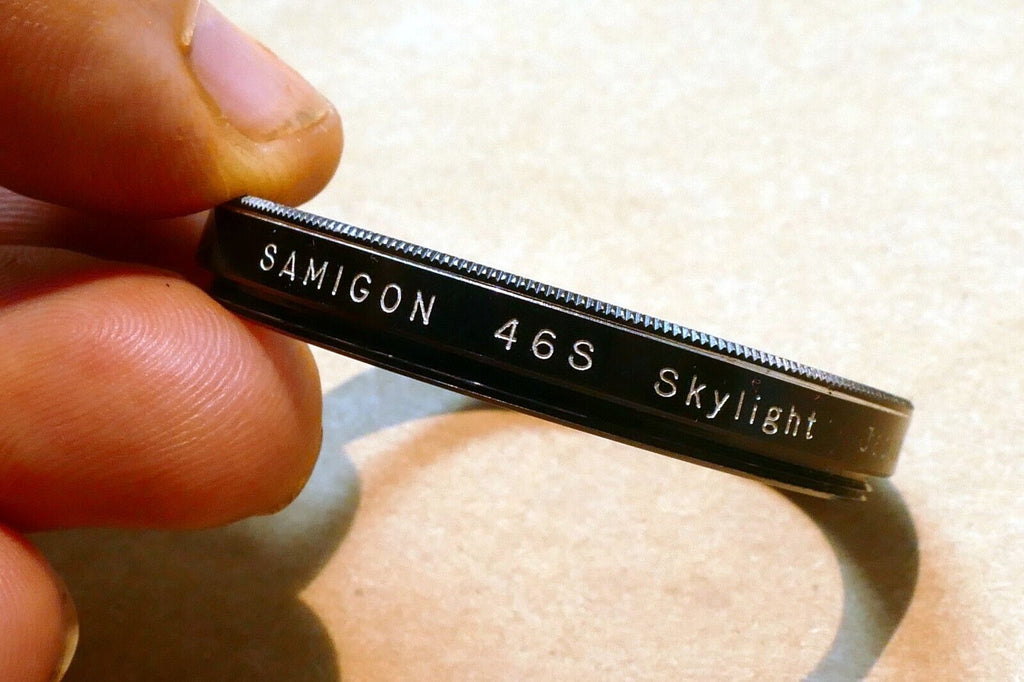 Samigon 46mm Filter Skylight 1A sky (with caoting damage , smudges)