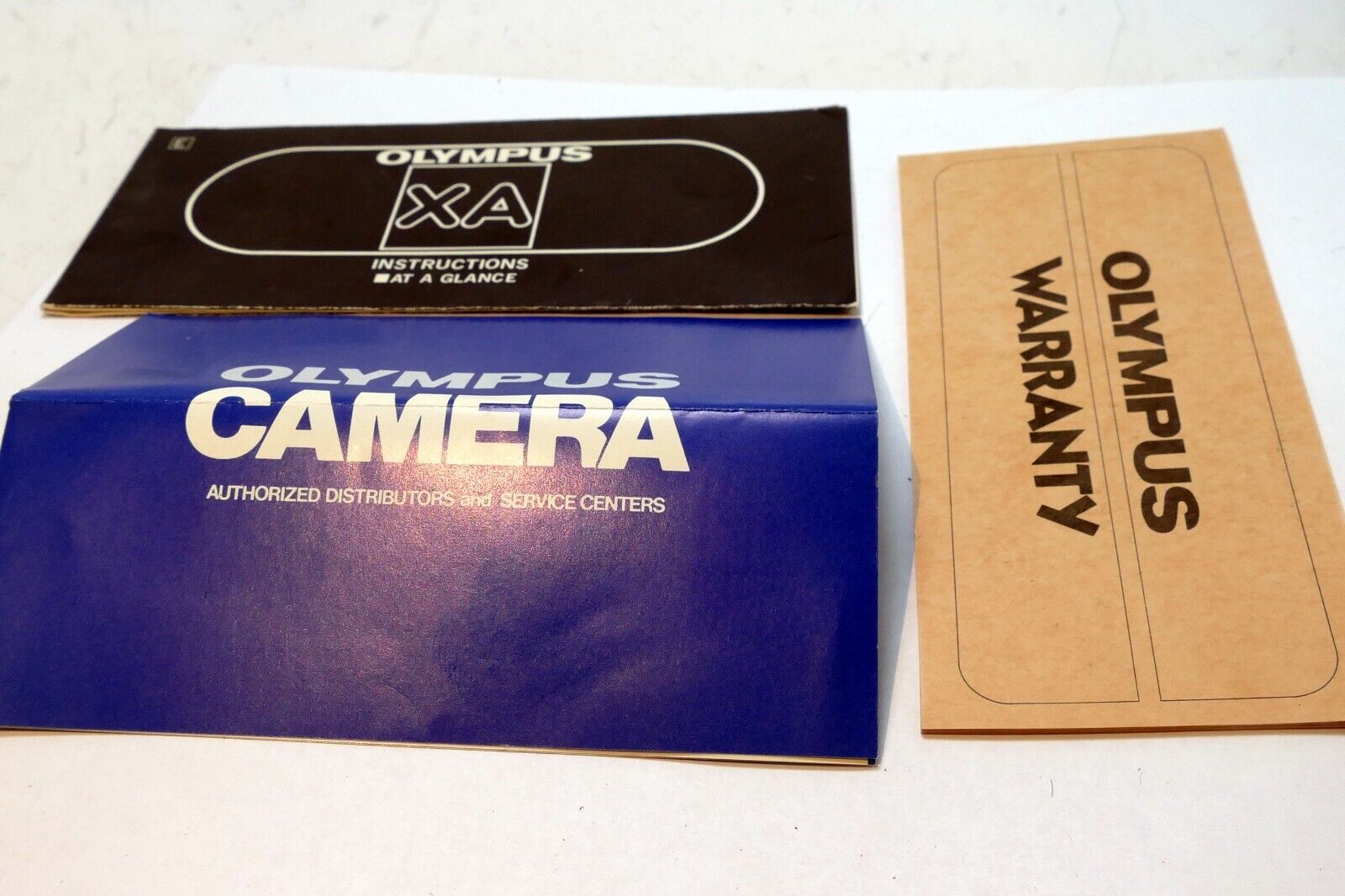 Olympus  XA Rangefinder camera Instruction Manual Guide - At A Glance concise
