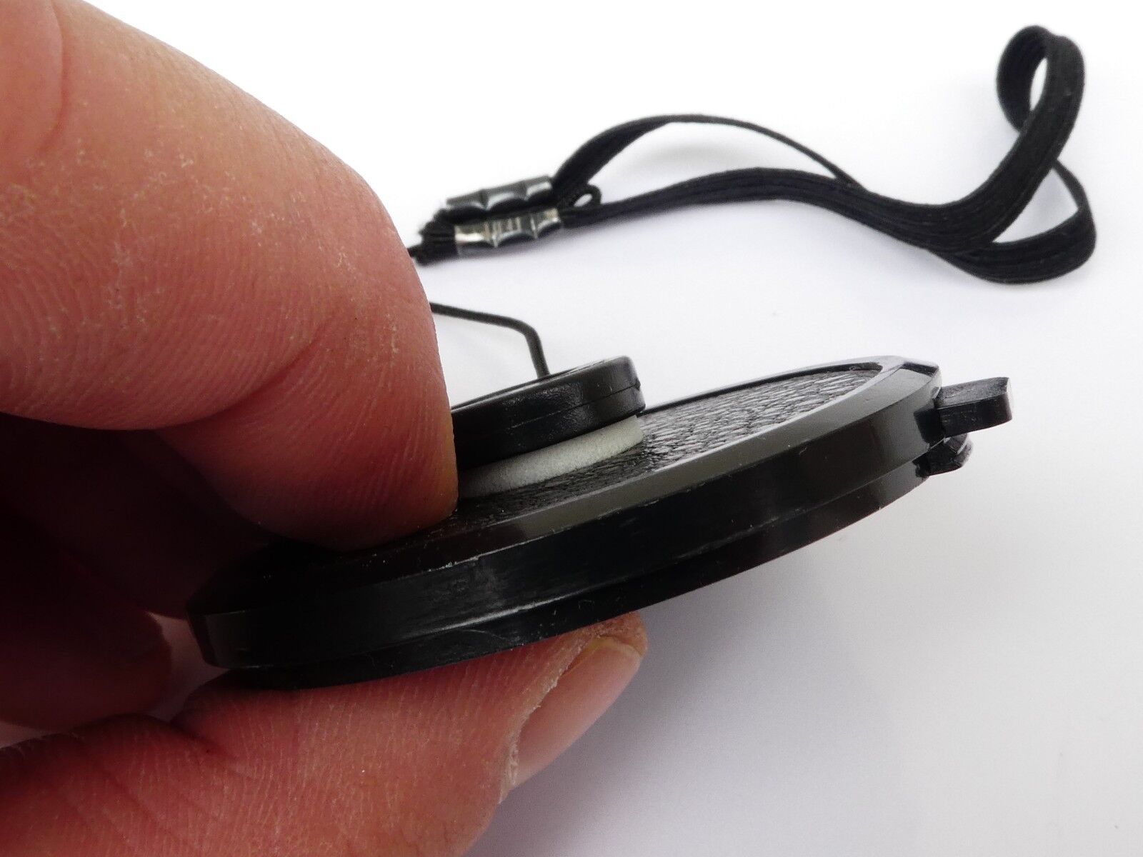 Used 49mm Lens Front Cap Black snap-on type plastic with strap Hong Kong