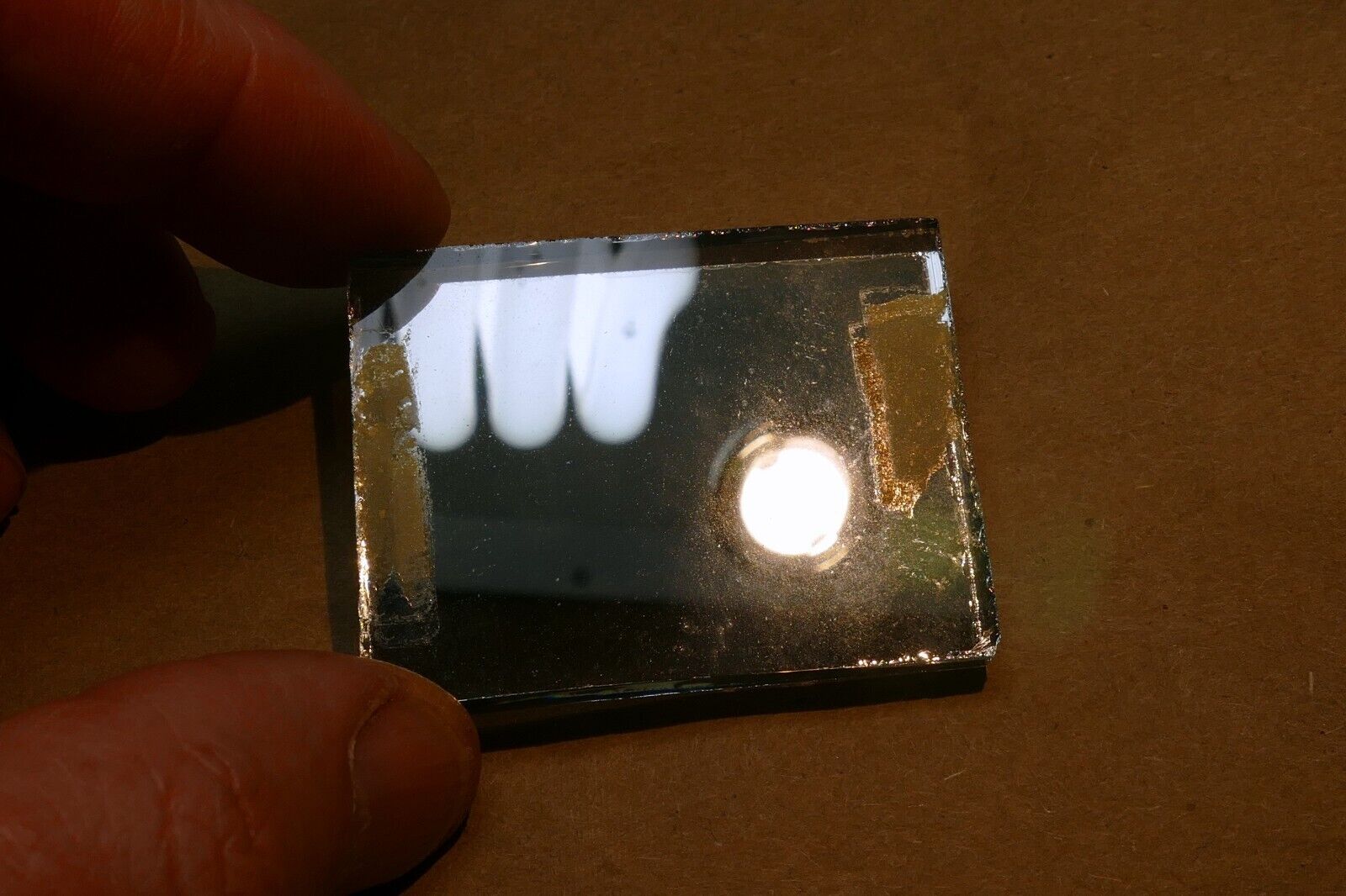 1.5X2" Diameter 0.25" thick First Surface 50% Semi-Transparent Mirror