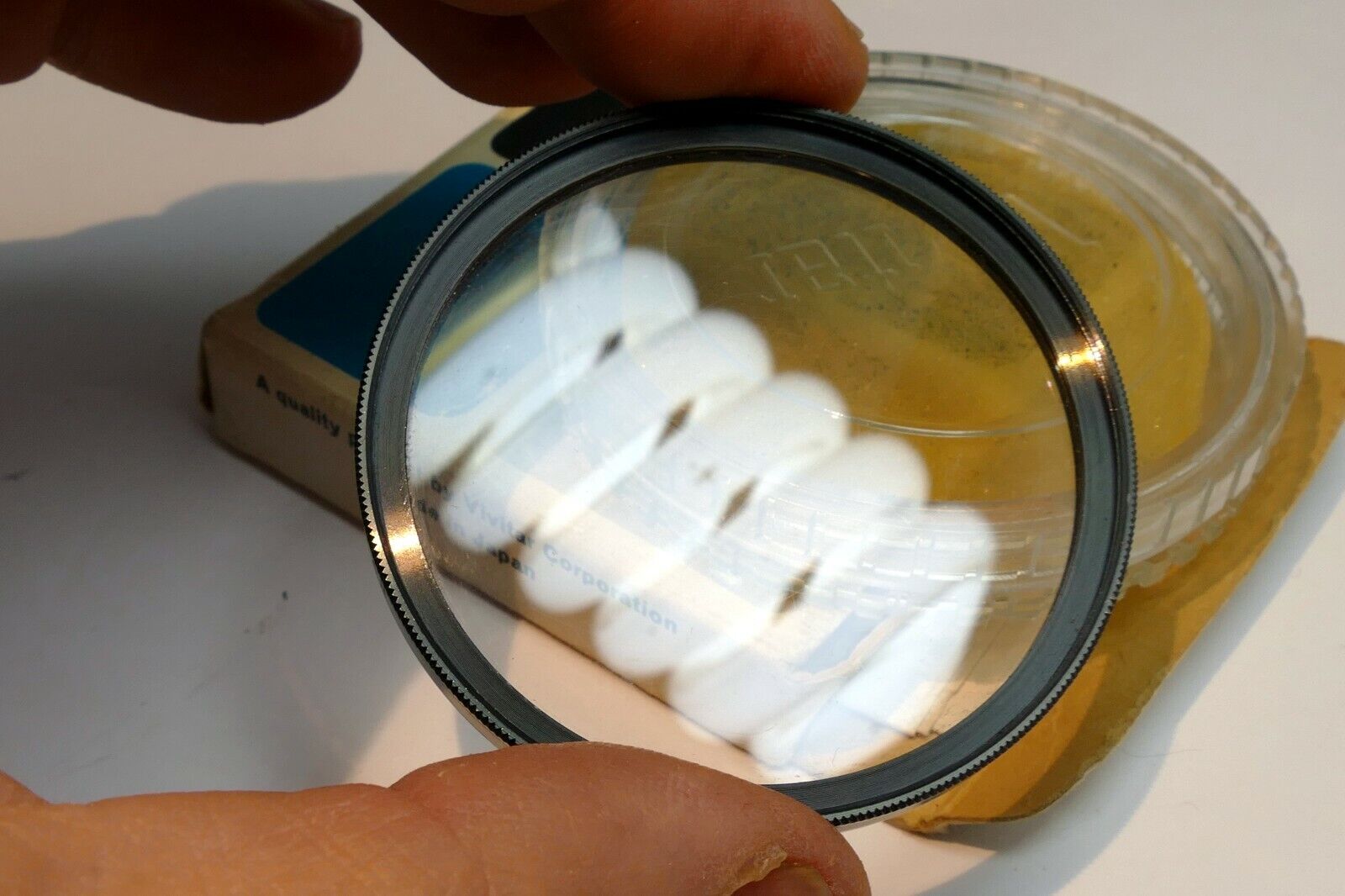 Vivitar 55mm Filter Skylight 1A  with plastic case (with some scratches)