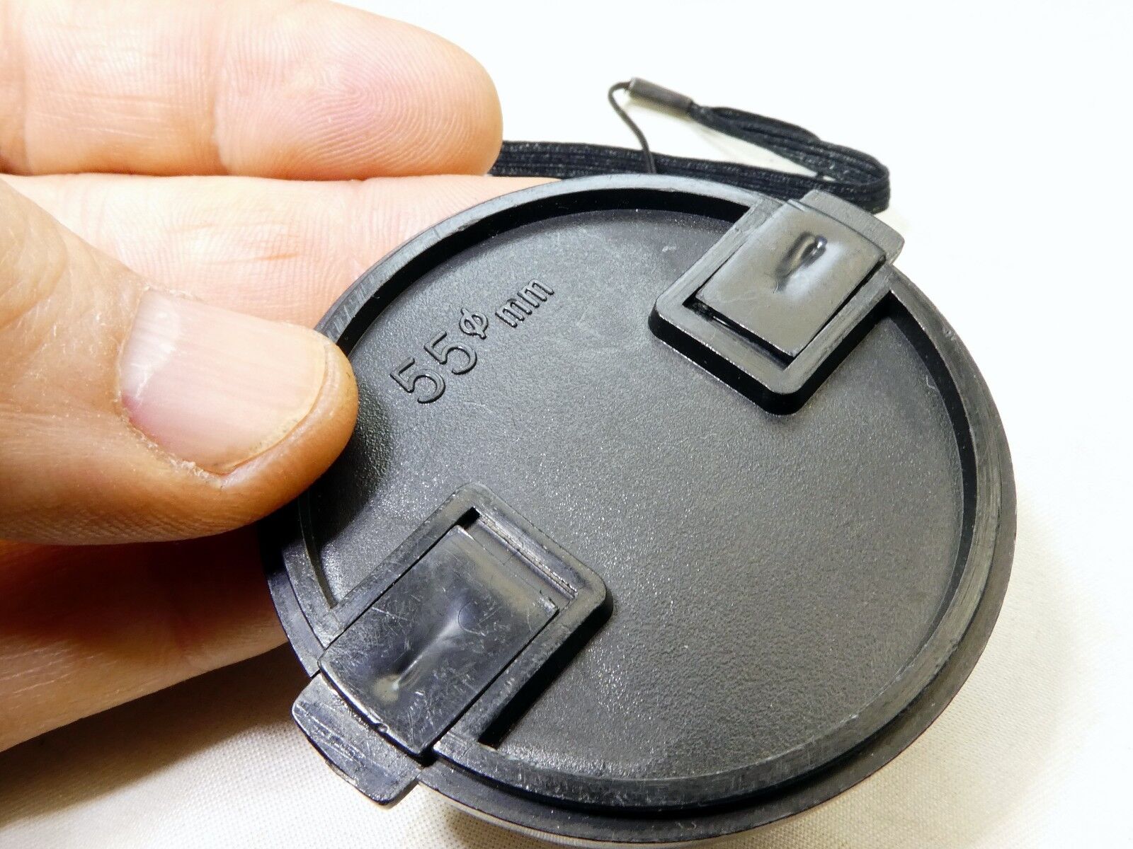 Black 55mm Lens front Cap  Snap on type with keeper string holder