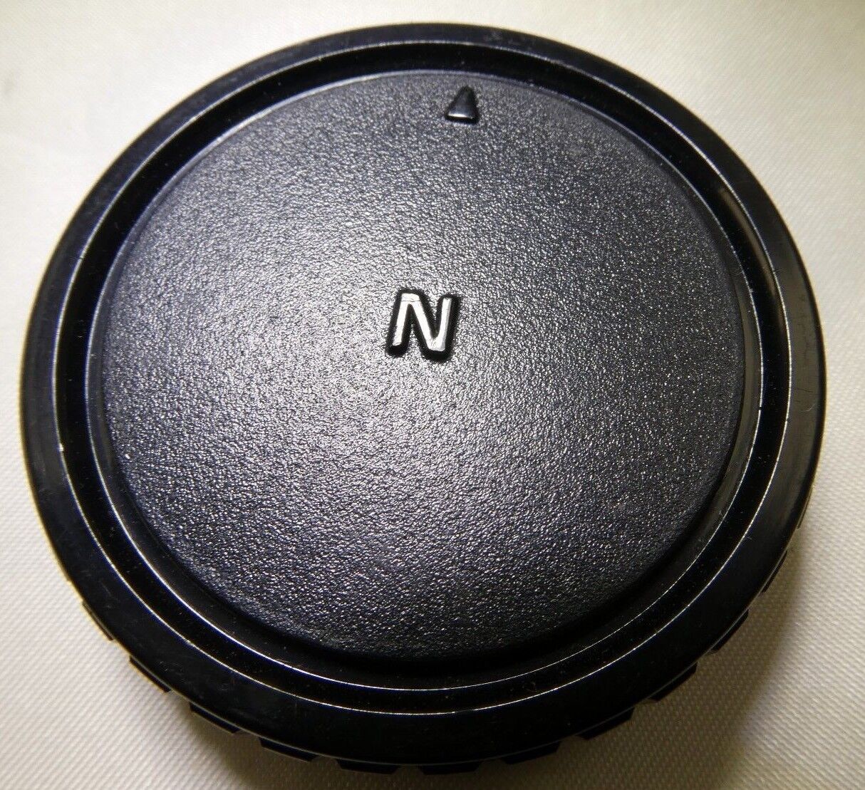 Used "N" Rear Lens Cap for Nikon F lenses 18-55mm  