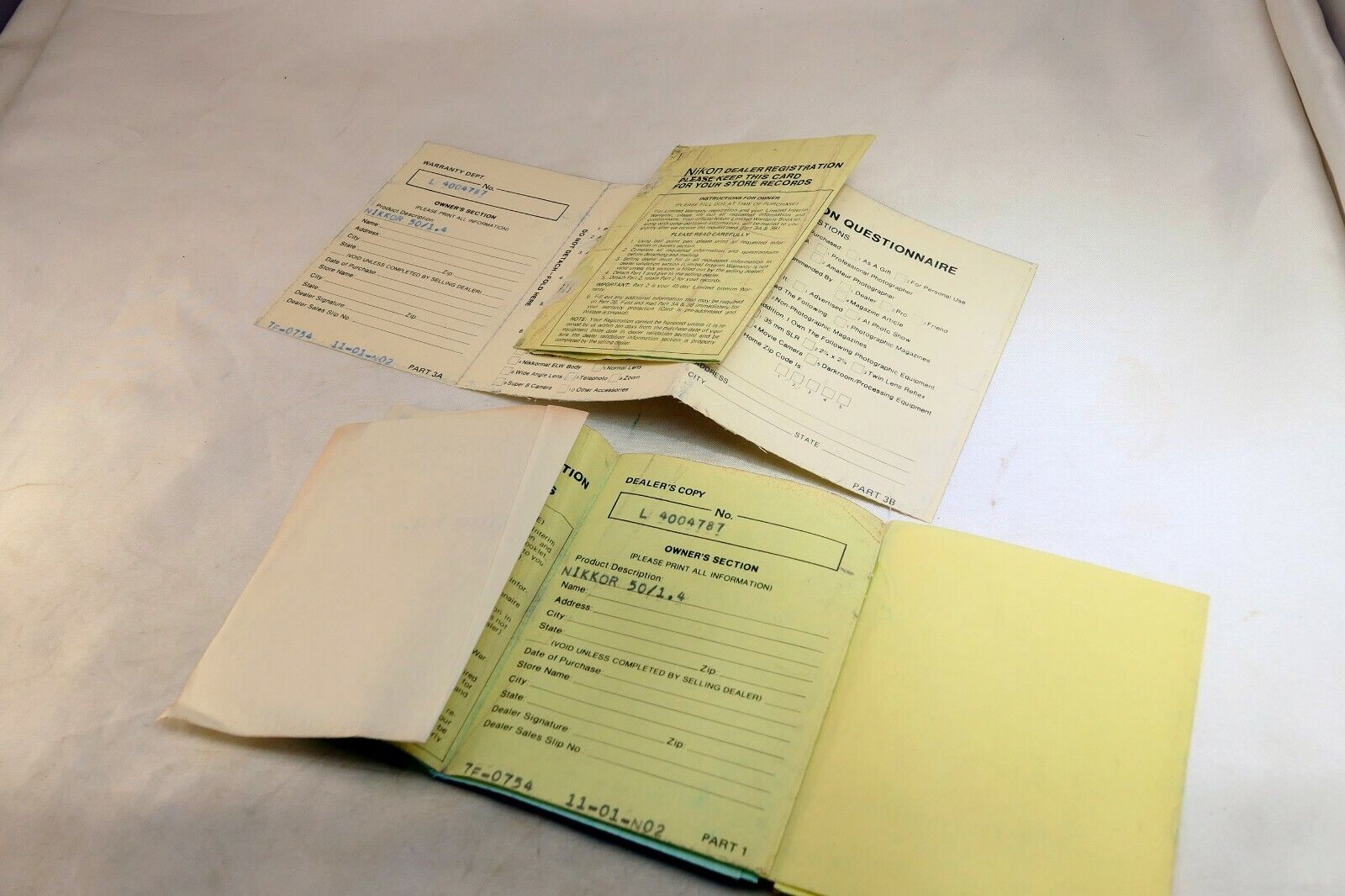 Nikon vintage warranty card (expired) for Nikkor 50mm f1.4 Non  Ai lens 1977