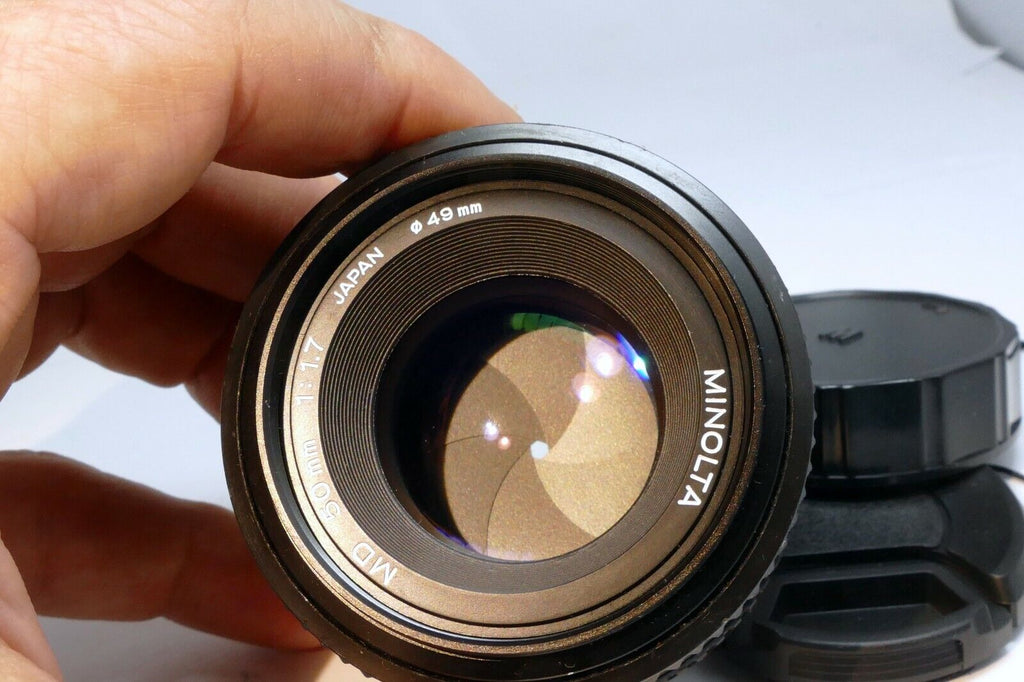 Minolta 50mm f1.7 MD manual focus with couple spots of fungus webbing works good