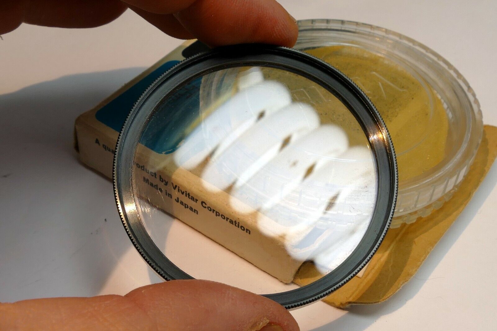 Vivitar 55mm Filter Skylight 1A  with plastic case (with some scratches)