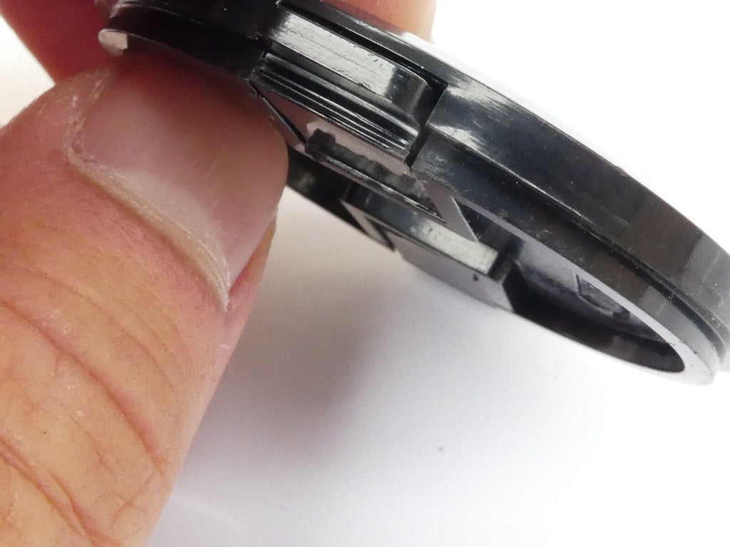 Used 49mm Lens Front Cap Black snap-on type made in Hong Kong plastic