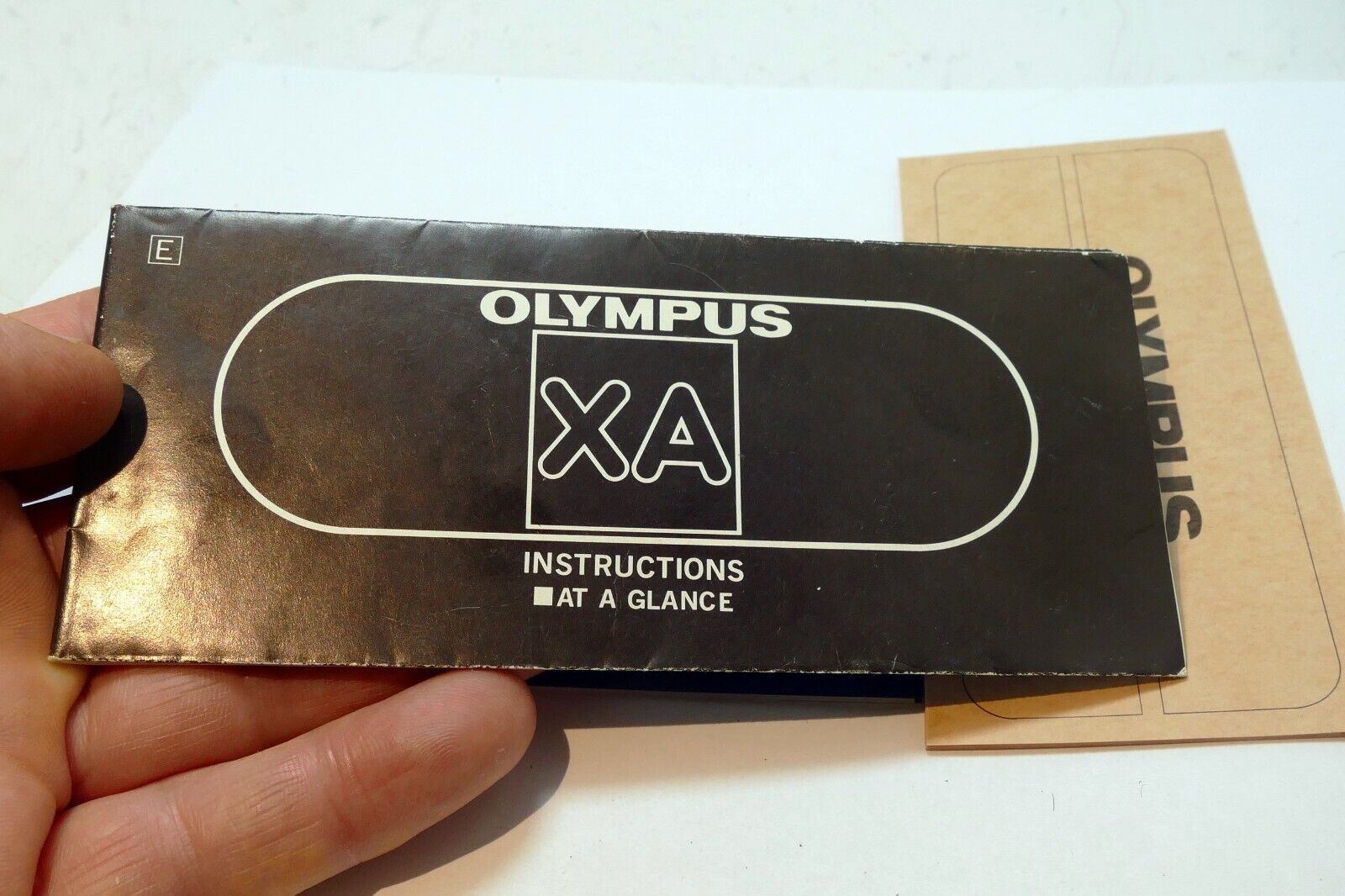 Olympus  XA Rangefinder camera Instruction Manual Guide - At A Glance concise