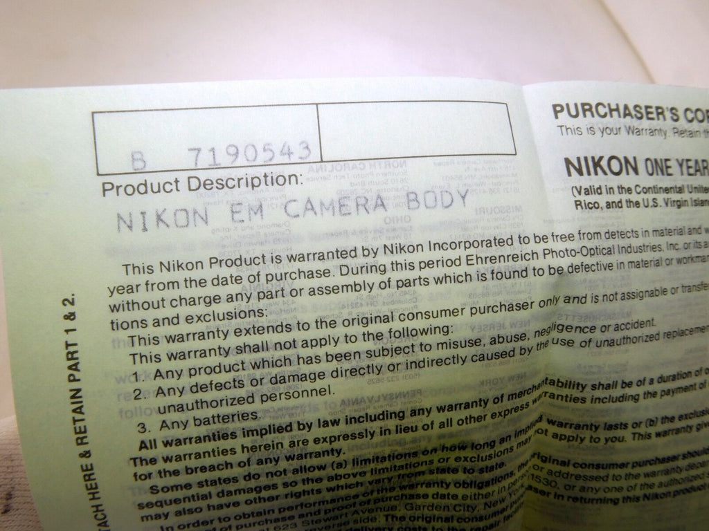 Nikon vintage warranty card (expired) for EM  camera  EN