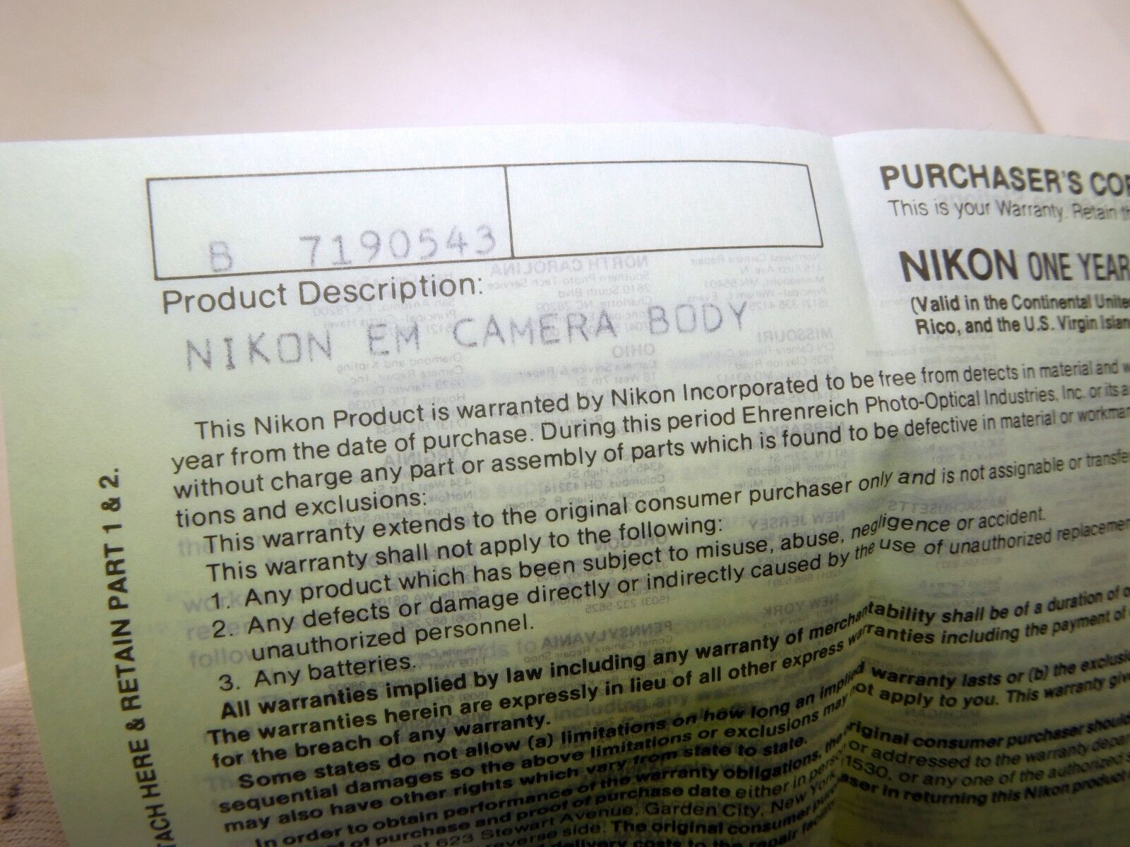 Nikon vintage warranty card (expired) for EM  camera  EN