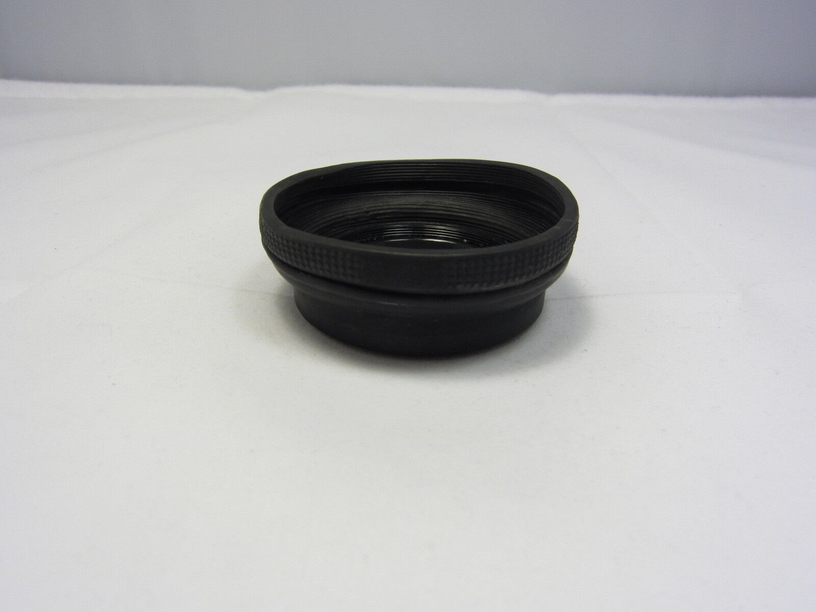 Used Unknown Brand 55mm Collapsible Rubber screw in Lens Hood N102025