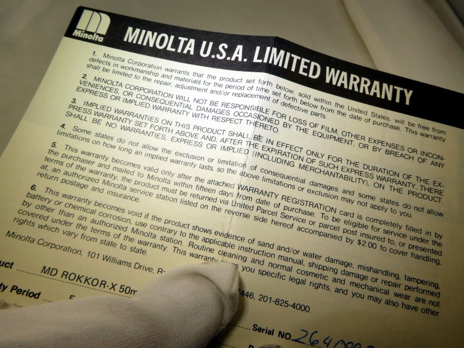 Minolta USA Limited Warranty card (EN) vintage MD Rokkor 50mm f1.7 1980
