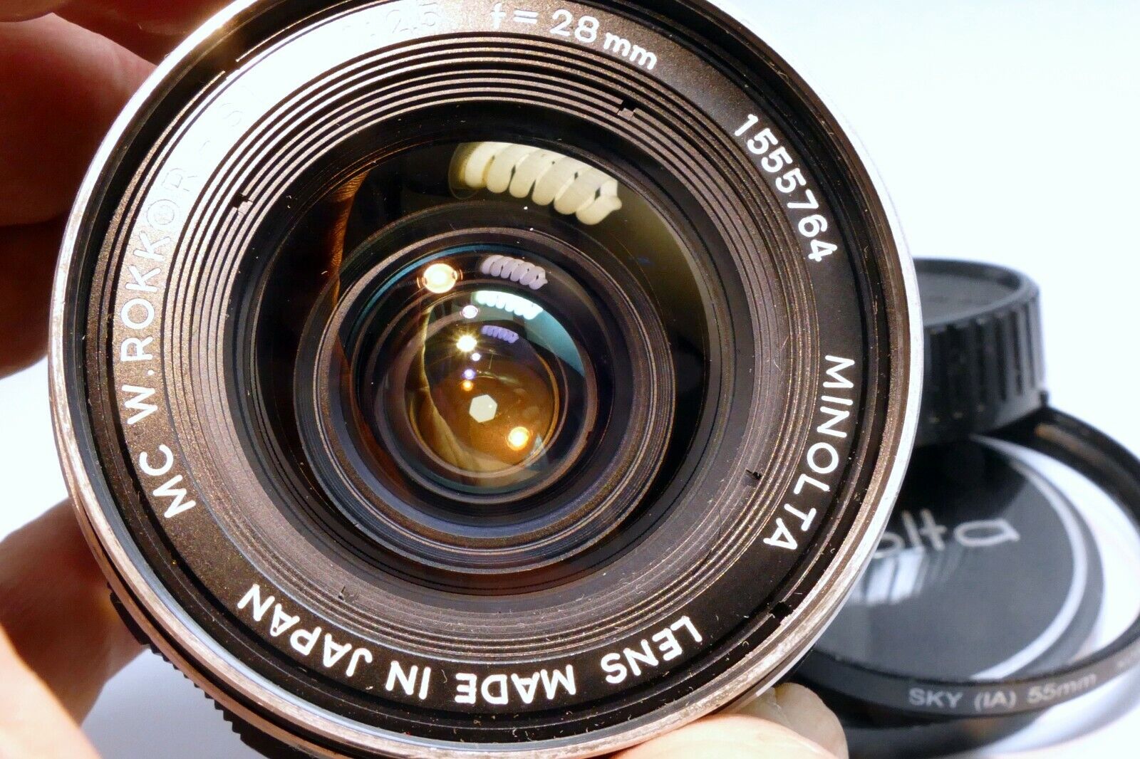 Minolta 28mm f2.5 Lens manual Focus MC W Rokkor- SI ( slow aperture, and dust )