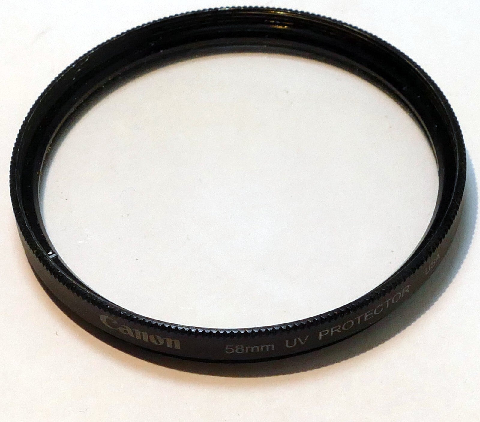 Canon 58mm Lens Protect filter for 18-55mm IS EF-s  - - OEM , made in USA