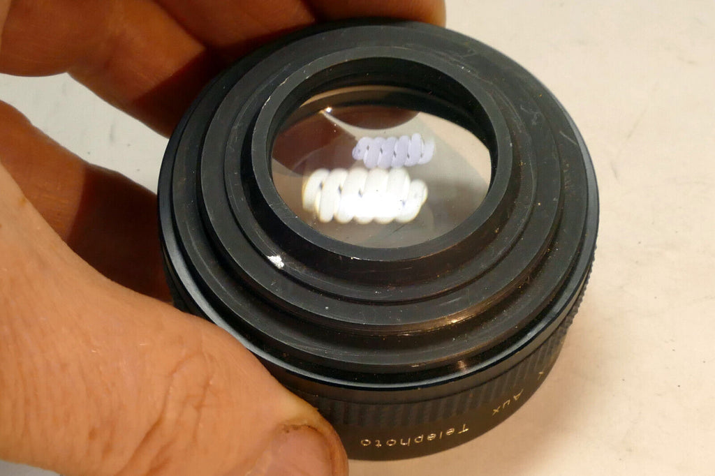 Hanimex AUX Telephoto 49mm Lens for Praktica (with some haze)