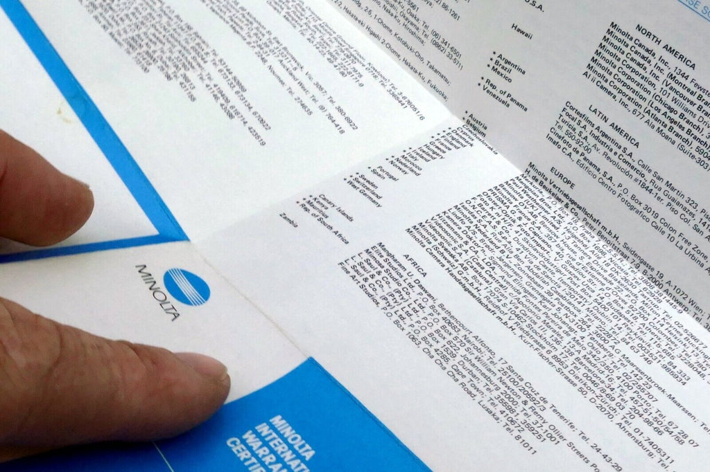 Minolta MD 50mm f2 Lens warranty information booklet  1970's