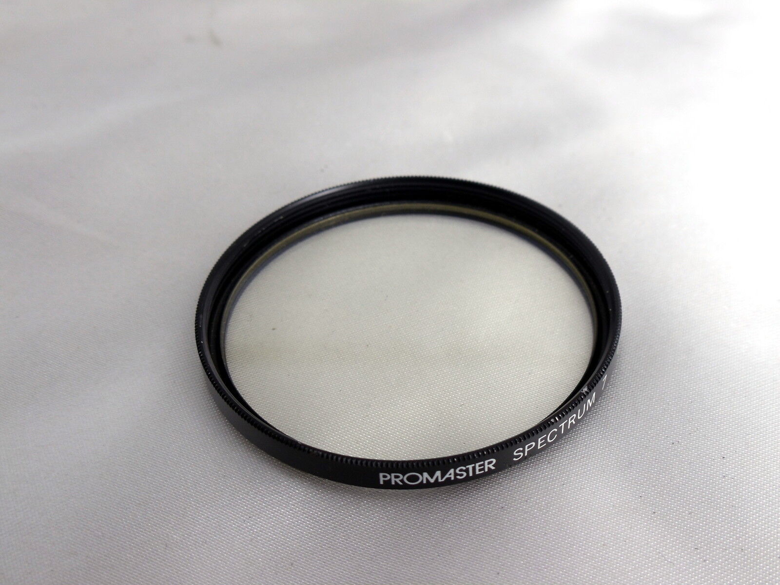 Used Promaster Spectrum 7 UV 52mm Lens Filter Made in Japan O32557