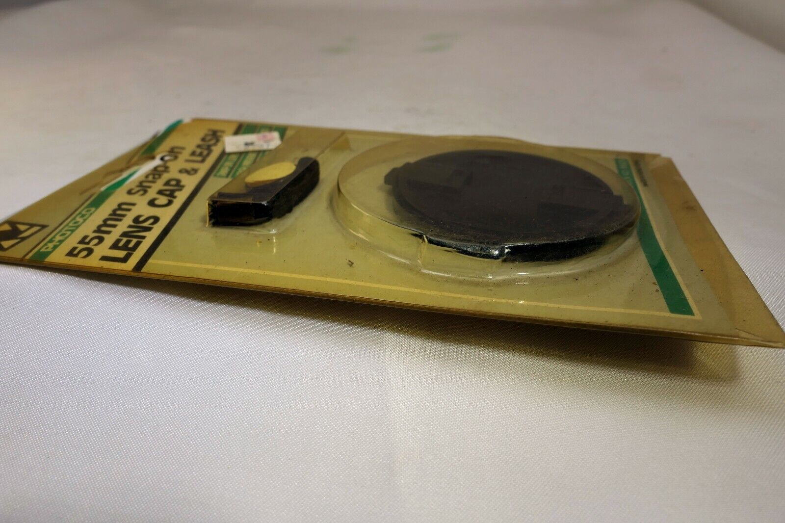 55mm Front Lens Cap  snap on type with leach keeper string P55CH