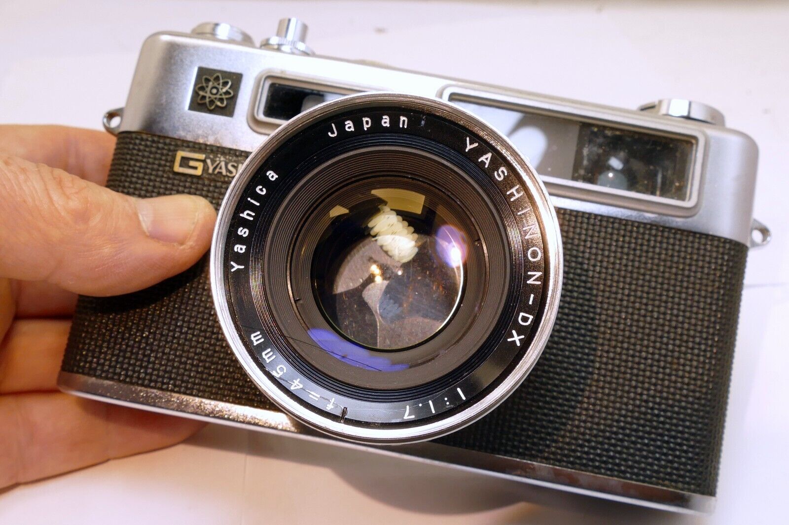 Yashica Electro 35 camera with 45mm f1.7 lens AS IS missing battery cover parts