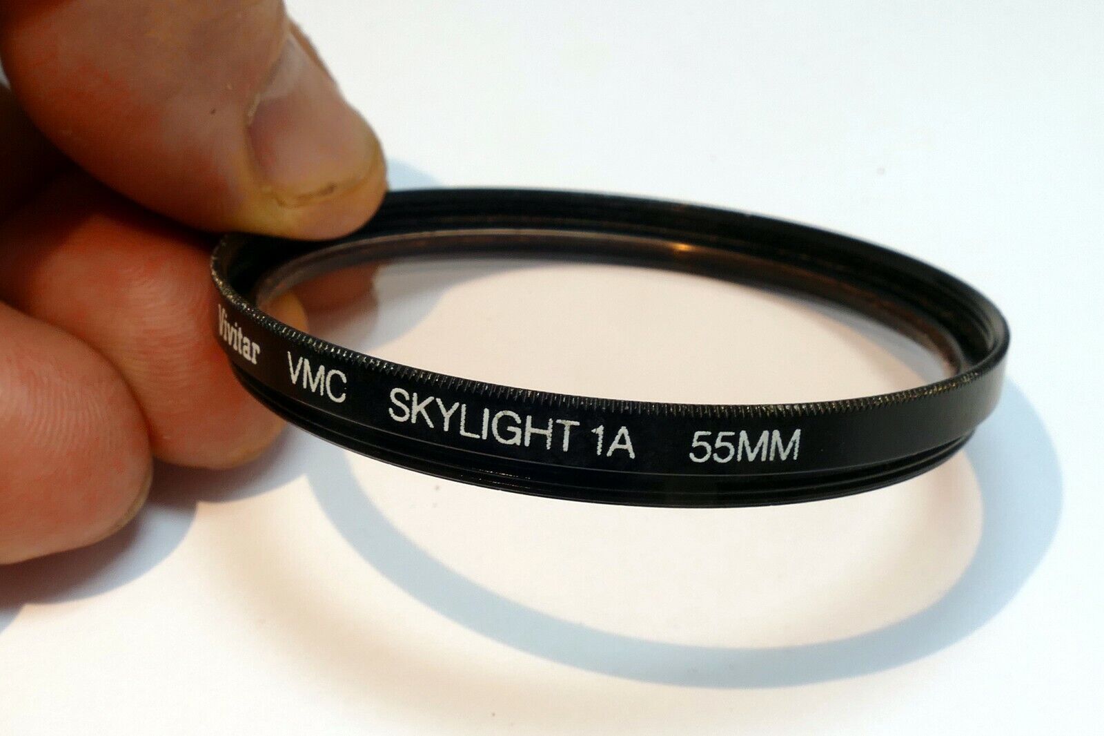 Vivitar  VMC 55mm Filter Skylight 1A sky  ( with coating scratched )