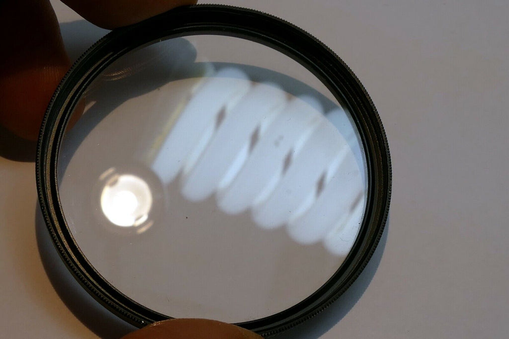 Sunpak 58mm UV made in Japan Glass lens filter threaded