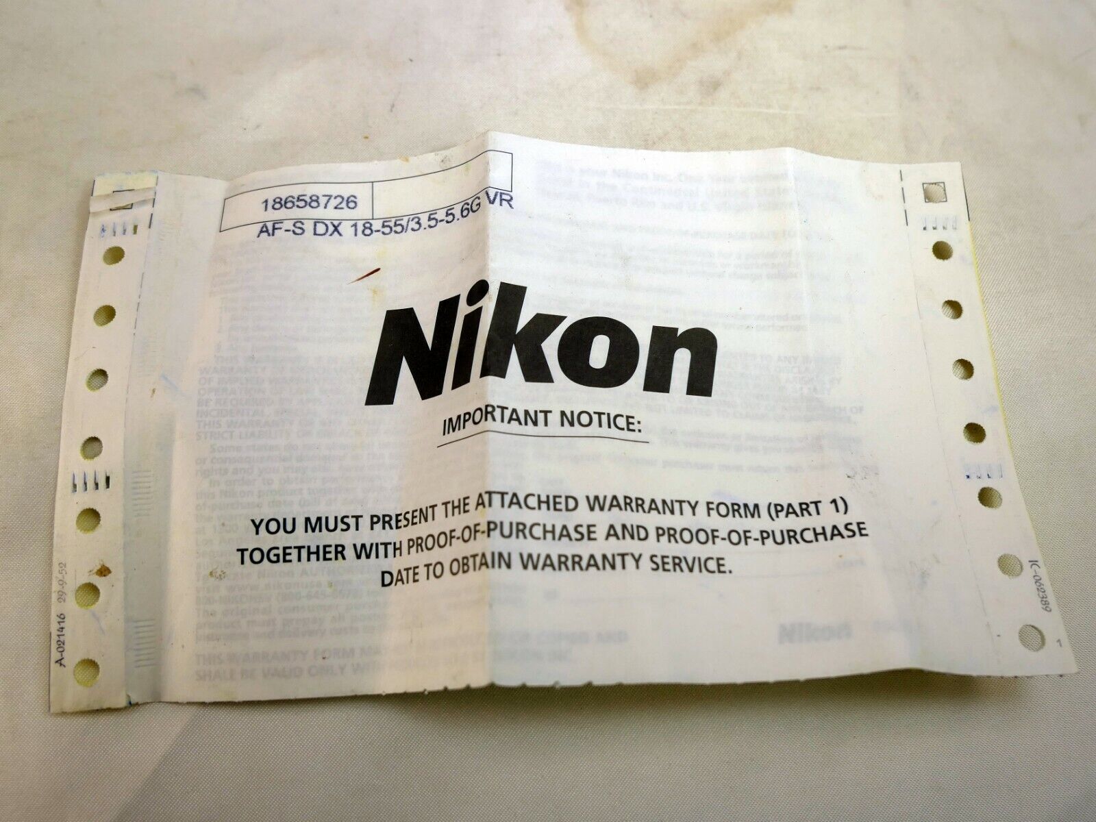 Nikon lens warranty card for 18-55mm f3.5-5.6 VR AF-S VR zoom  lens kit